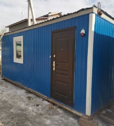 Вагончик синий c OSB отделкой, металлическая дверь Вагончик синий c OSB отделкой, металлическая дверь